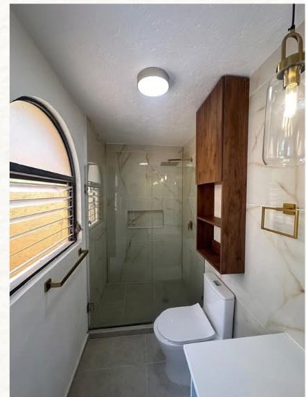 Remodelación de baño con cancel de vidrio